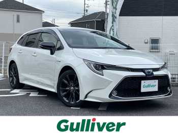 トヨタ カローラツーリング ハイブリッド ダブルバイビー 純7型ナビTSS衝突軽減半革席コナセンBカメ