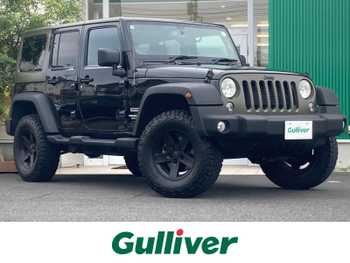 クライスラー・ジープ ジープ ラングラー アンリミテッド スポーツ ブロックタイヤ リフトUP  社外マフラー