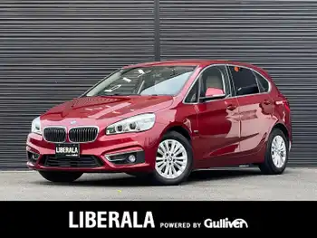 ＢＭＷ ２１８ｄ アクティブツアラー ラグジュアリー コンフォートP インテリジェントS 白革