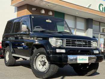 トヨタ ランドクルーザー プラド SX ワイド ナビ ハブロック シートカバー 15インチAW