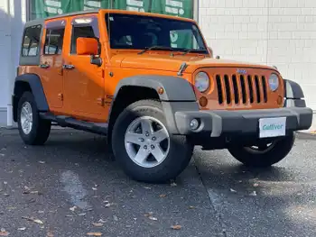 クライスラー・ジープ ジープ ラングラー アンリミテッド オレンジ 4WD 純正ホイール メモリナビ ワンセグテ