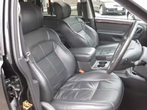 カタログ画像：ジープ・グランドチェロキー （JEEP GRAND CHEROKEE） リミテッド 2003年6月 GH-WJ40 4000cc ブリリアントブラッククリスタルパールコート 燃費6.5km / l 内装