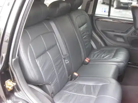 カタログ画像：ジープ・グランドチェロキー （JEEP GRAND CHEROKEE） リミテッド 2003年6月 GH-WJ40 4000cc ブリリアントブラッククリスタルパールコート 燃費6.5km / l 内装