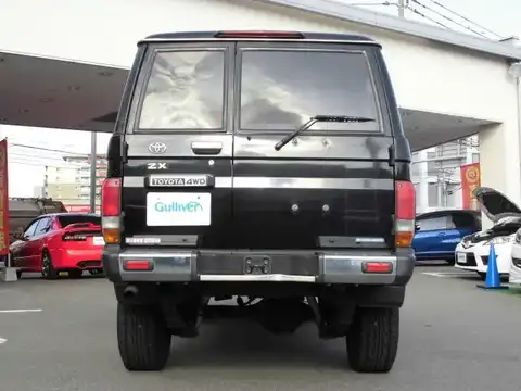 カタログ画像：ランドクルーザー７０ （LAND CRUISER 70） ＺＸ ４ドア 1996年8月 KC-HZJ77HV 4200cc ブラック バック