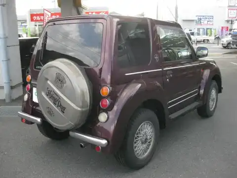 カタログ画像：パジェロジュニア （PAJERO JR） フライング パグ 1997年9月 E-H57A 1100cc サンチャゴレッド バック