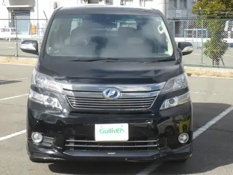 カタログ画像：ヴェルファイアハイブリッド （VELLFIRE HYBRID） ハイブリッドＸ サイドリフトアップシート装着車 2014年4月 DAA-ATH20W 2400cc ブラック 燃費16.2km / l フロント