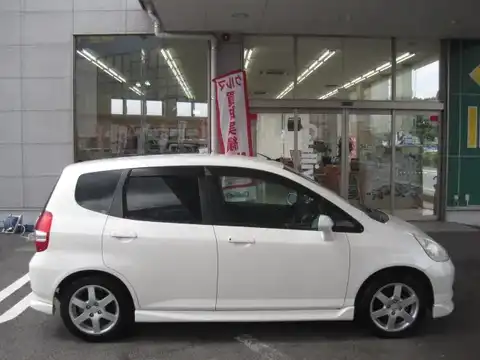 カタログ画像：フィット （FIT） Ｗ 2002年11月 LA-GD1 1300cc タフタホワイト 燃費23.0km / l 外装