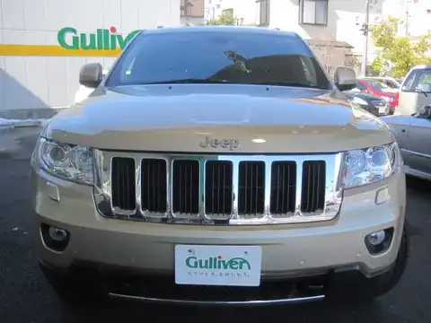 カタログ画像：ジープ・グランドチェロキー （JEEP GRAND CHEROKEE） リミテッド 2011年3月 ABA-WK36A 3600cc ホワイトゴールドクリアコート 燃費7.7km / l フロント