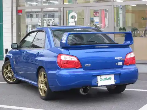 カタログ画像：インプレッサ （IMPREZA） ＷＲＸ 2004年4月 TA-GDA 2000cc ＷＲブルー・マイカ 燃費11.4km / l バック