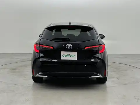カタログ画像：カローラツーリング （COROLLA TOURING） ハイブリッド Ｘ 2024年4月 6AA-ZWE215W 1800cc アティチュードブラックマイカ 燃費27.8km / l バック