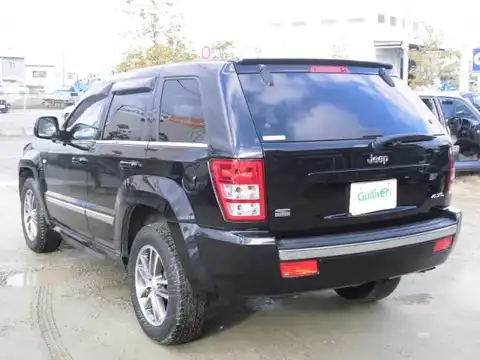 カタログ画像：ジープ・グランドチェロキー （JEEP GRAND CHEROKEE） Ｓ－リミテッド 2008年12月 ABA-WH47 4700cc ブリリアントブラッククリスタルパールコートorダークカーボンパールコート 燃費6.2km / l バック