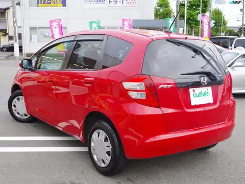 カタログ画像：フィット （FIT） Ｌ ハイウェイエディション 2008年6月 DBA-GE7 1300cc ミラノレッド 燃費17.0km / l バック