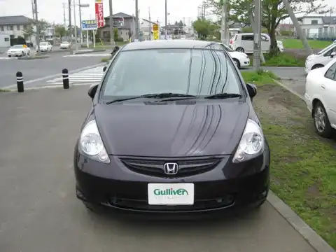 カタログ画像：フィット （FIT） １．３Ｗ 2006年7月 DBA-GD1 1300cc ブラックアメジスト・パール 燃費23.0km / l フロント