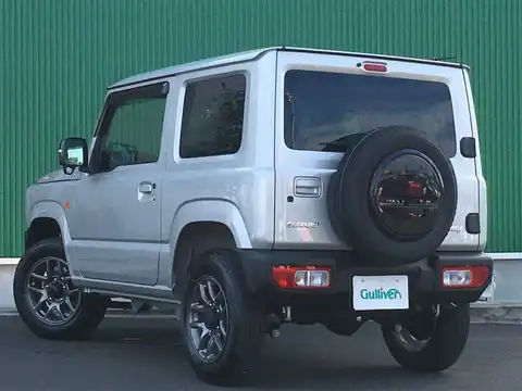 カタログ画像：ジムニー （JIMNY） ＸＣ 2021年10月 3BA-JB64W 660cc シルキーシルバーメタリック 燃費14.3km / l バック