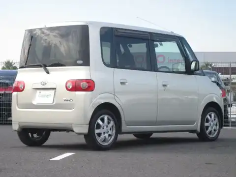 カタログ画像：タント （TANTO） Ｘ 2004年4月 LA-L360S 660cc シャンパンメタリックオパール 燃費16.8km / l バック