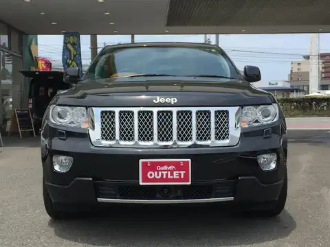 カタログ画像：ジープ・グランドチェロキー （JEEP GRAND CHEROKEE） オーバーランド サミット 2012年2月 ABA-WK57A 5700cc ブリリアントブラッククリスタルパールコート 燃費6.1km / l フロント