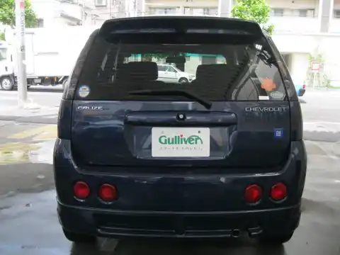 カタログ画像：シボレークルーズ （CHEVROLET CRUSE） １．３ＬＴ Ｓ－セレクション 2004年12月 UA-HR52S 1300cc パールメタリックカシミールブルー 燃費18.0km / l バック