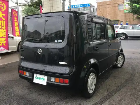 カタログ画像：キューブ （CUBE） ＳＸ ７０ｔｈ 2003年5月 UA-BZ11 1400cc スーパーブラック 燃費17.2km / l バック