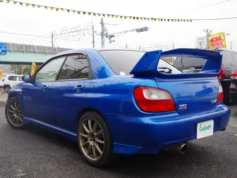 カタログ画像：インプレッサＷＲＸ （IMPREZA WRX） ＳＴｉ 2000年10月 GH-GDB 2000cc ＷＲブルーマイカ 燃費10.4km / l バック