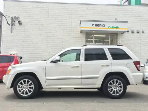 カタログ画像：ジープ・グランドチェロキー （JEEP GRAND CHEROKEE） オーバーランド５．７ ＨＥＭＩ 2006年6月 GH-WH57 5700cc ストーンホワイトクリアコート 燃費5.7km / l 外装