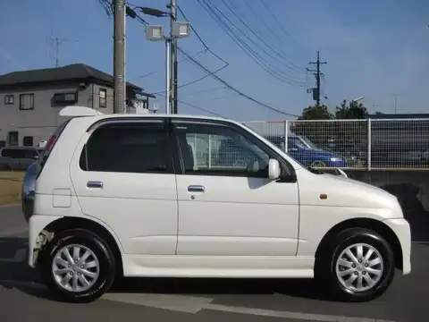 カタログ画像：テリオスキッド （TERIOS KID） カスタムＬ 2010年8月 ABA-J111G 660cc パールホワイトＩ 燃費16.8km / l 外装