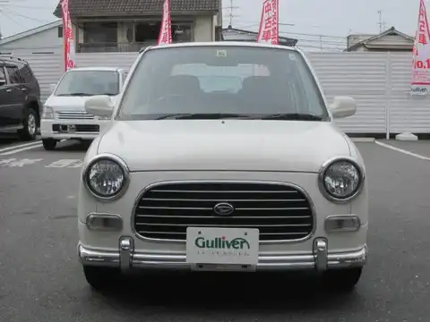 カタログ画像：ミラジーノ （MIRA GINO） ジーノ・ターボ 1999年3月 GF-L710S 660cc パールホワイトII 燃費16.0km / l フロント