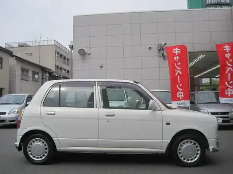 カタログ画像：ミラジーノ （MIRA GINO） ジーノ・ターボ 1999年11月 GF-L710S 660cc パールホワイトI 燃費16.0km / l 外装