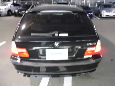 カタログ画像：３シリーズ （3 SERIES） ３２５ｉツーリング 2004年4月 GH-AV25 2500cc ブラックⅡ（ソリッド・カラー） 燃費9.4km / l バック