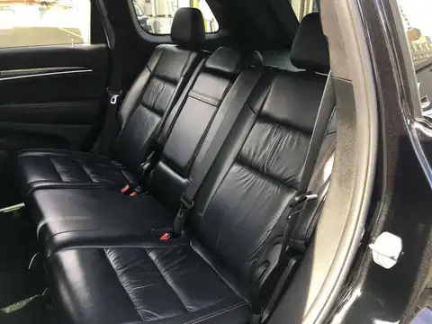 カタログ画像：ジープ・グランドチェロキー （JEEP GRAND CHEROKEE） ７５ｔｈアニバーサリーエディション 2016年7月 ABA-WK36TA 3600cc ブリリアントブラッククリスタルパールコート 燃費9.6km / l 内装