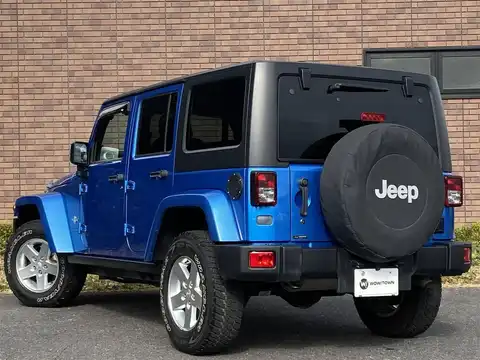 カタログ画像：ジープ・ラングラーアンリミテッド （JEEP WRANGLER UNLIMITED） フリーダムエディション 2014年4月 ABA-JK36L 3600cc ハイドロブルーパールコート 燃費7.5km / l バック