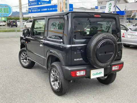 カタログ画像：ジムニー （JIMNY） ＸＬ スズキセーフティサポート装着車 2021年10月 3BA-JB64W 660cc ブルーイッシュブラックパール3 燃費14.3km / l バック