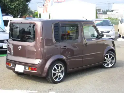 カタログ画像：キューブ （CUBE） プラスコンラン 2004年5月 UA-BNZ11 1400cc ショコラ（ＰＭ） 燃費15.8km / l バック