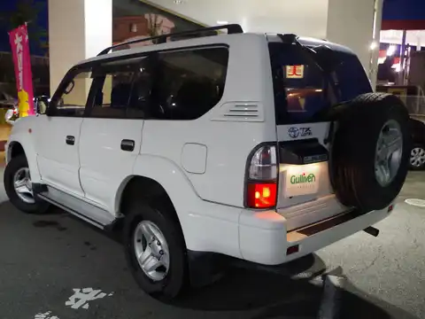 カタログ画像：ランドクルーザープラド （LAND CRUISER PRADO） ＴＸリミテッド 2001年8月 KH-KDJ95W 3000cc ホワイト 燃費10.2km / l バック