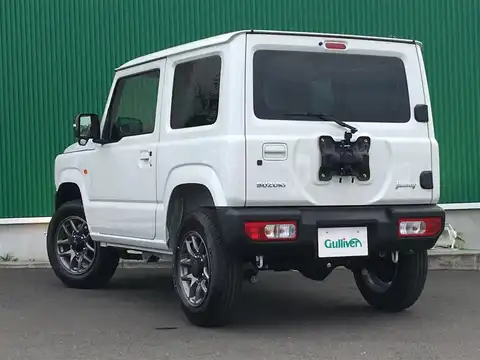 カタログ画像：ジムニー （JIMNY） ＸＬ スズキセーフティサポート装着車 2021年10月 3BA-JB64W 660cc ホワイト 燃費14.3km / l バック