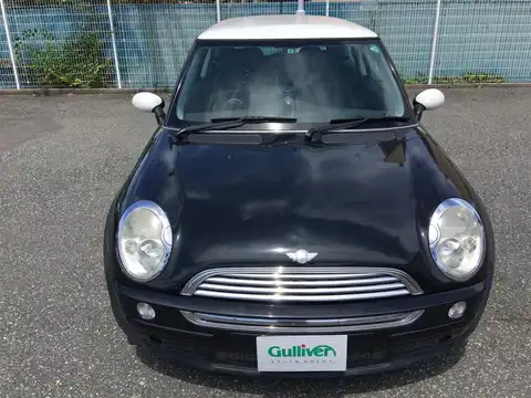 カタログ画像：ＭＩＮＩ （MINI） クーパー 2004年4月 GH-RA16 1600cc コスモス・ブラックメタリック 燃費14.4km / l フロント