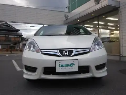 カタログ画像：フィットシャトル （FIT SHUTTLE） １５Ｘ 2011年8月 DBA-GG8 1500cc プレミアムホワイト・パール 燃費14.6km / l フロント