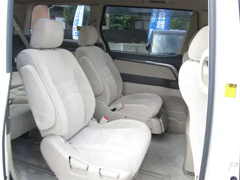 カタログ画像：アルファードハイブリッド （ALPHARD HYBRID） Ｇエディション サイドリフトアップシート装着車 2006年6月 DAA-ATH10W 2400cc ホワイトパールマイカ 燃費16.4km / l 内装