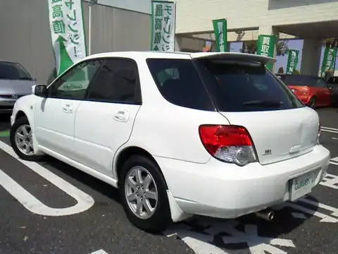 カタログ画像：インプレッサスポーツワゴン （IMPREZA SPORTS WAGON） １５ｉ 2004年6月 TA-GG3 1500cc ピュアホワイト 燃費13.4km / l バック