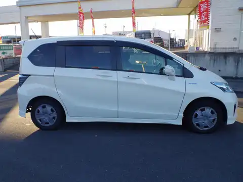 カタログ画像：フリードハイブリッド （FREED HYBRID） ハイブリッド プレミアムエディション 2015年5月 DAA-GP3 1500cc ホワイトオーキッド・パール 燃費21.6km / l 外装