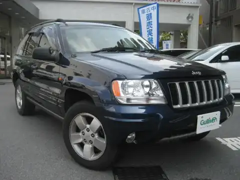 カタログ画像：ジープ・グランドチェロキー （JEEP GRAND CHEROKEE） リミテッドＶ８ 2004年4月 GH-WJ47 4700cc パトリオットブルーパールコート 燃費5.9km / l メイン