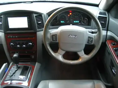 カタログ画像：ジープ・グランドチェロキー （JEEP GRAND CHEROKEE） リミテッド４．７ 2006年6月 GH-WH47 4700cc ミッドナイトブルーパールコート 燃費6.1km / l 内装