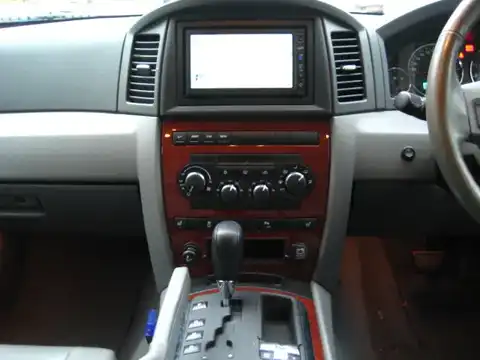 カタログ画像：ジープ・グランドチェロキー （JEEP GRAND CHEROKEE） リミテッド４．７ 2006年6月 GH-WH47 4700cc ミッドナイトブルーパールコート 燃費6.1km / l 内装