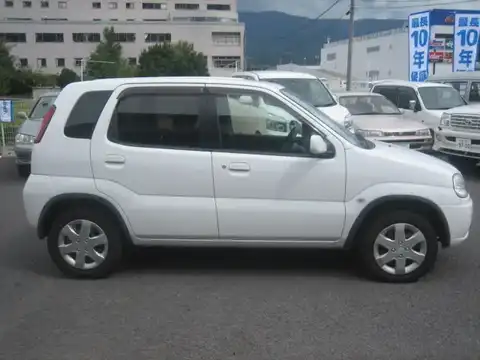 カタログ画像：スイフト （SWIFT） Ｌリミテッド 2003年12月 UA-HT51S 1300cc スペリアホワイト 燃費18.0km / l 外装