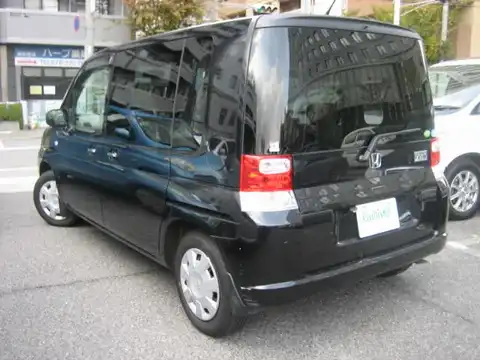 カタログ画像：モビリオ （MOBILIO） Ｘ ＨＤＤナビファインエディション 2006年7月 DBA-GB1 1500cc ナイトホークブラック・パール 燃費16.0km / l バック