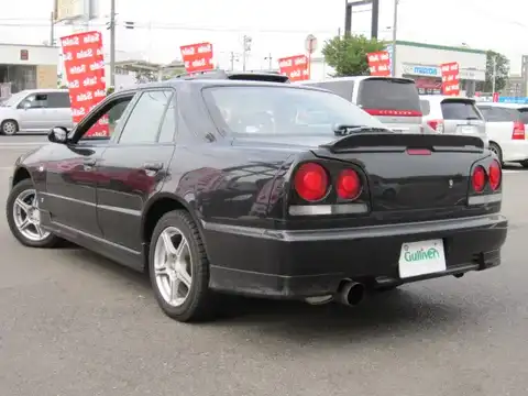 カタログ画像：スカイライン （SKYLINE） ２５ＧＴ ＦＯＵＲ Ｌセレクション 1999年8月 GF-ENR34 2500cc ブラックパール 燃費9.2km / l バック