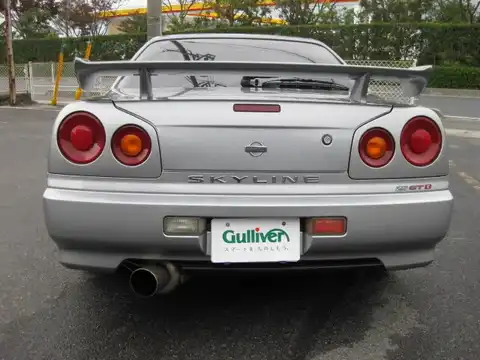 カタログ画像：スカイライン （SKYLINE） ２５ＧＴ 1998年5月 GF-ER34 2500cc ソニックシルバー（Ｍ） 燃費10.6km / l バック