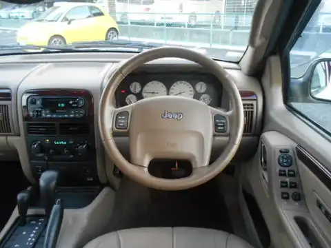 カタログ画像：ジープ・グランドチェロキー （JEEP GRAND CHEROKEE） リミテッド 2004年4月 GH-WJ40 4000cc ストーンホワイトクリアコート 燃費6.5km / l 内装