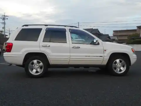 カタログ画像：ジープ・グランドチェロキー （JEEP GRAND CHEROKEE） リミテッド 2004年4月 GH-WJ40 4000cc ストーンホワイトクリアコート 燃費6.5km / l 外装