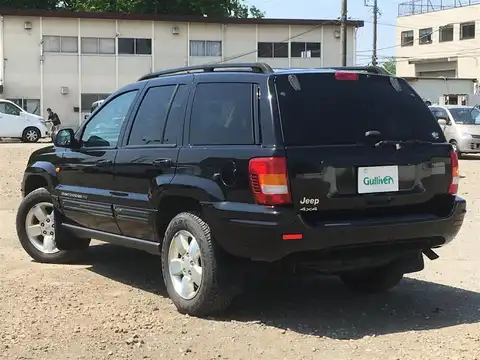 カタログ画像：ジープ・グランドチェロキー （JEEP GRAND CHEROKEE） リミテッド 2003年6月 GH-WJ40 4000cc パトリオットブルーパールコート 燃費6.5km / l バック