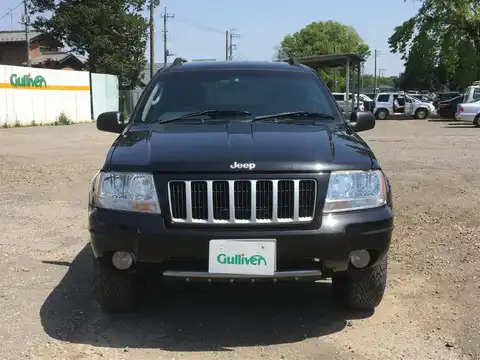 カタログ画像：ジープ・グランドチェロキー （JEEP GRAND CHEROKEE） リミテッド 2003年6月 GH-WJ40 4000cc パトリオットブルーパールコート 燃費6.5km / l フロント